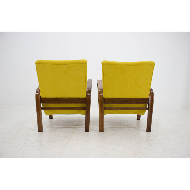 Paire de fauteuils jaunes par Karel Kozelka et Antonin Kropacek