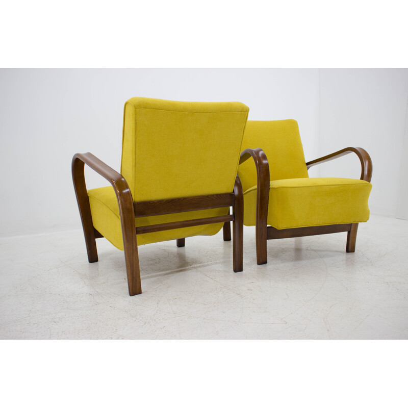 Pair of yellow armchairs by Karel Kozelka and Antonin Kropacek