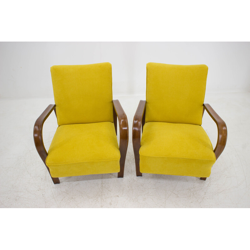 Pair of yellow armchairs by Karel Kozelka and Antonin Kropacek