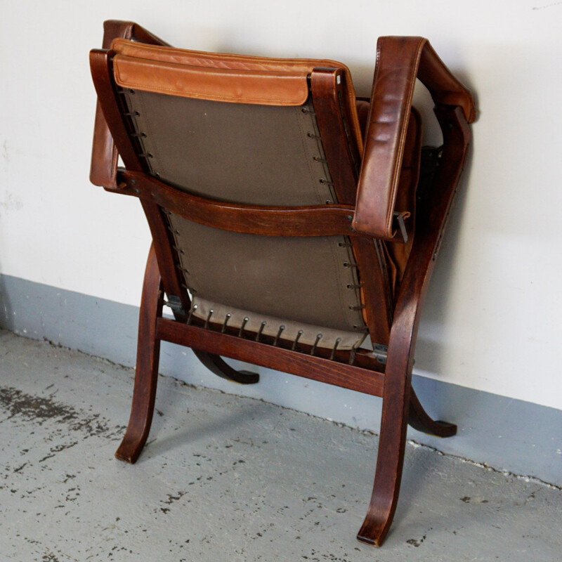 Vintage cognac leather lounge chair Flex by Ingmar Relling for Westnofa