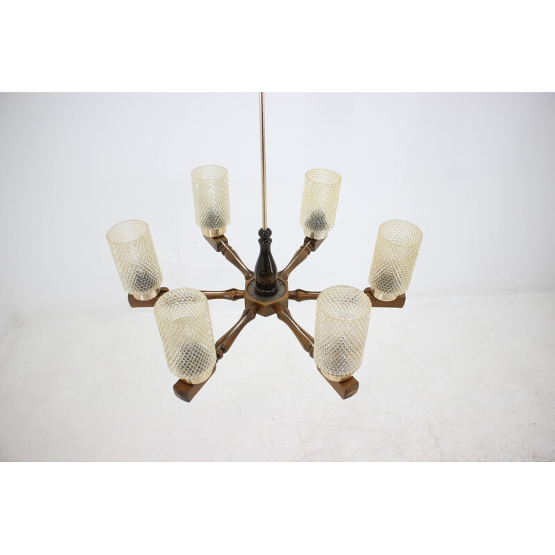 Vintage big chandelier in wood and glass