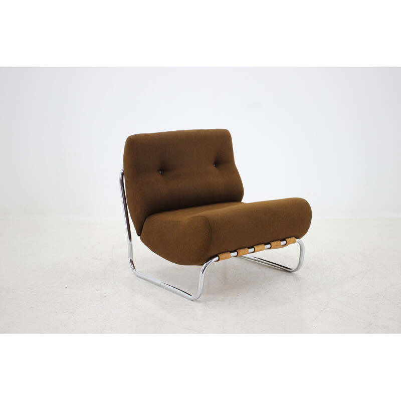 German vintage lounge chair in steel and brown fabric