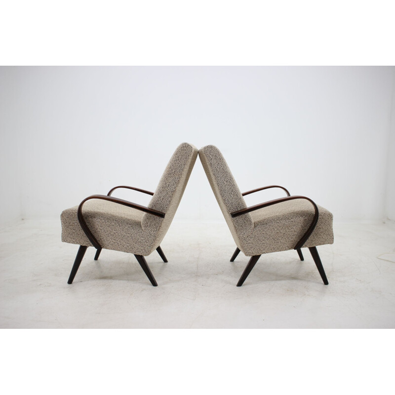 Pair of beech armchairs by Jindřich Halabala