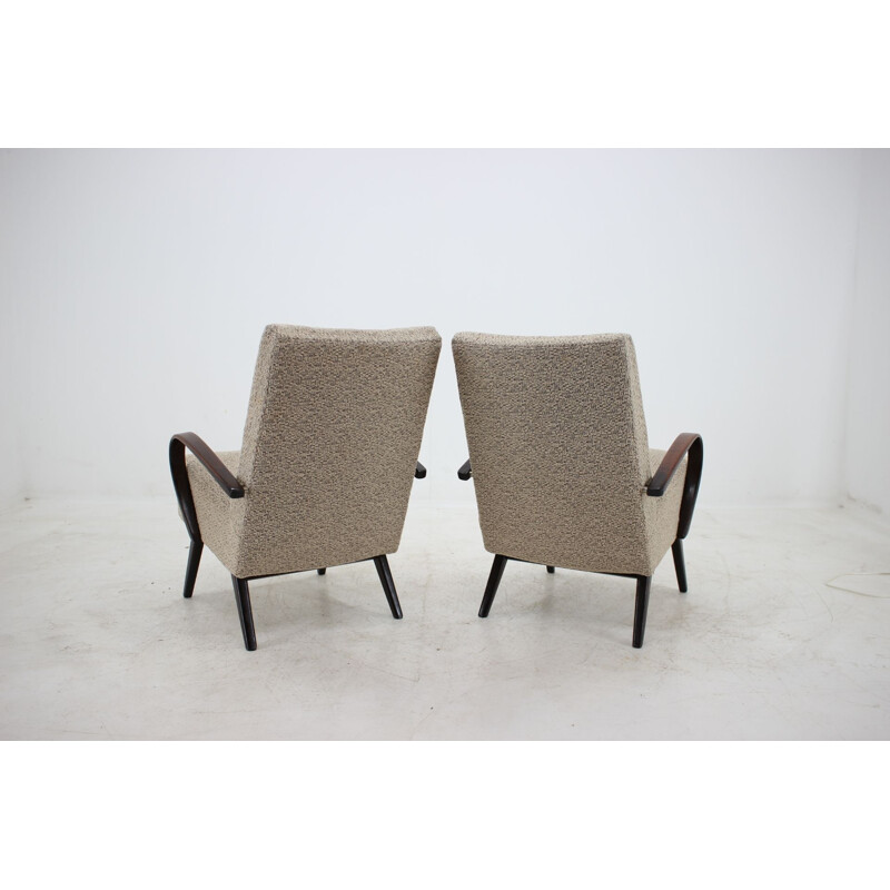 Pair of beech armchairs by Jindřich Halabala