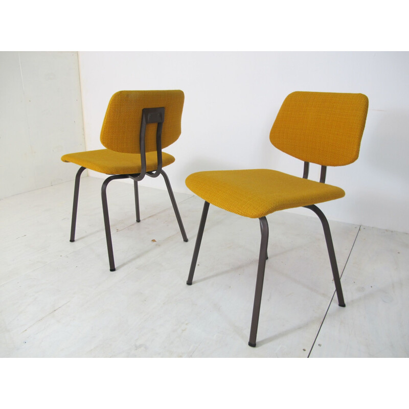 Pair of vintage yellow chairs in steel and fabric