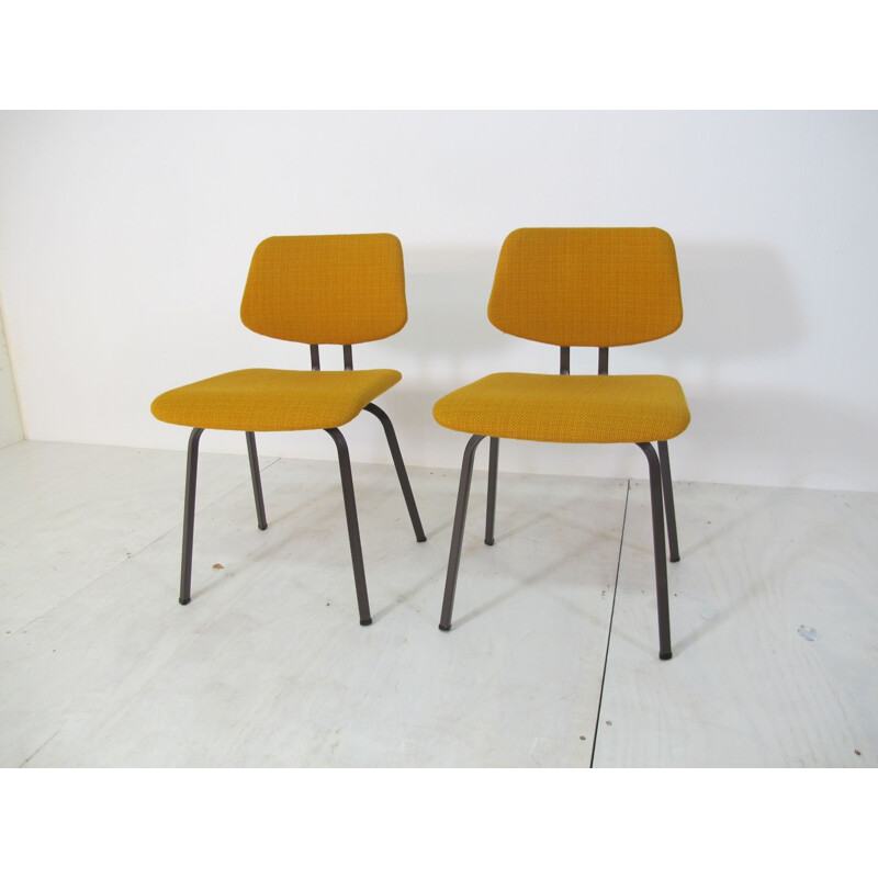 Pair of vintage yellow chairs in steel and fabric