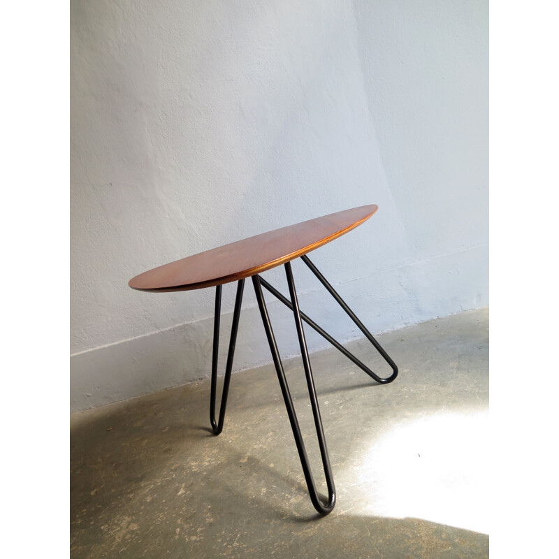 Vintage side table in teak with three black metal legs,1950