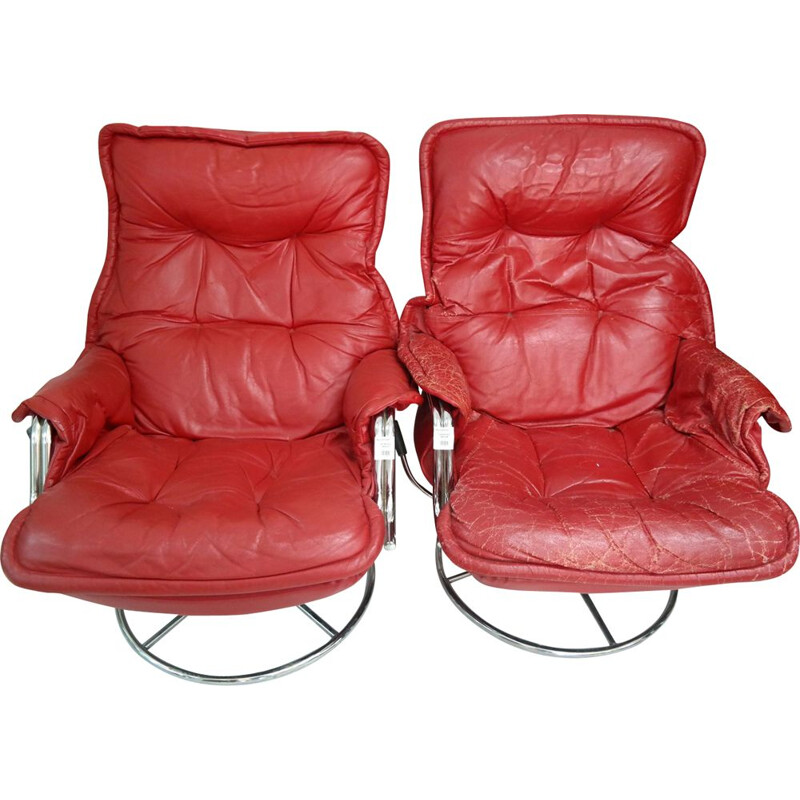 Set of 2 vintage armchairs in red leather and chrome plated 1970s