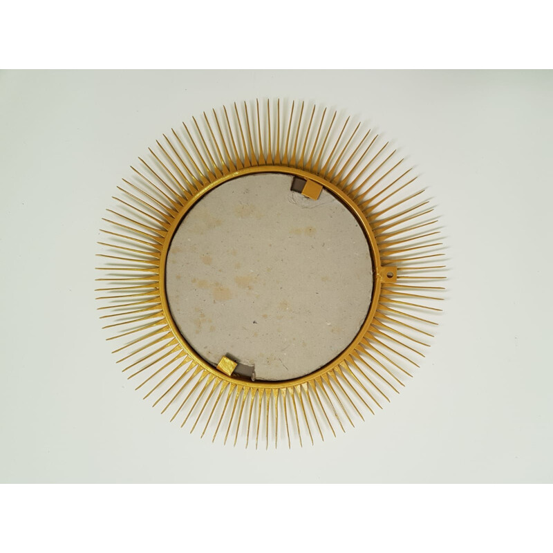 Vintage sunburst mirror in gilded metal