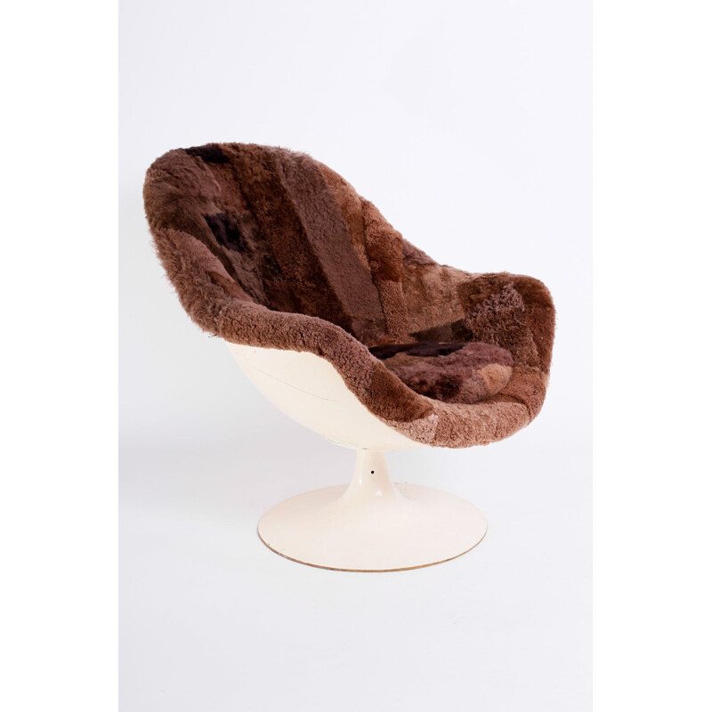 Vintage steel and sheepskin swivel chair, 1960