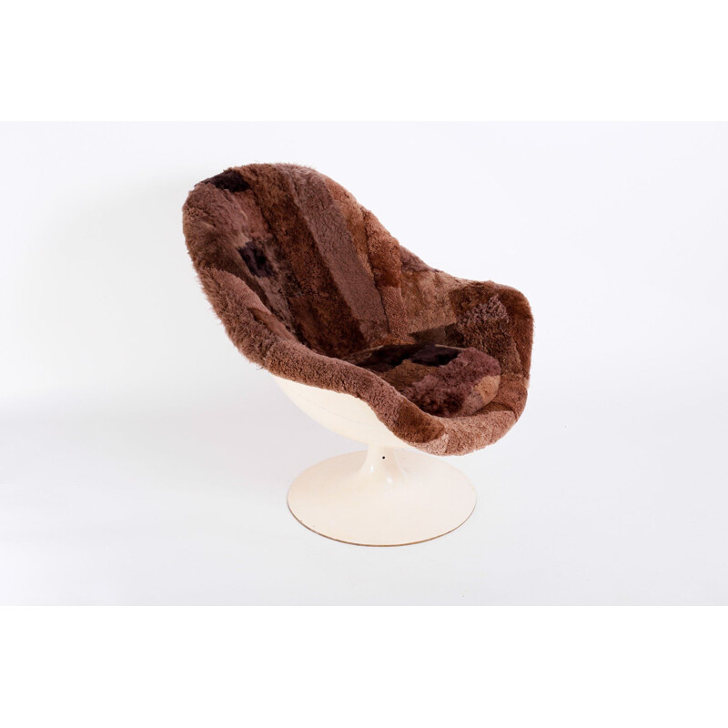 Vintage steel and sheepskin swivel chair, 1960