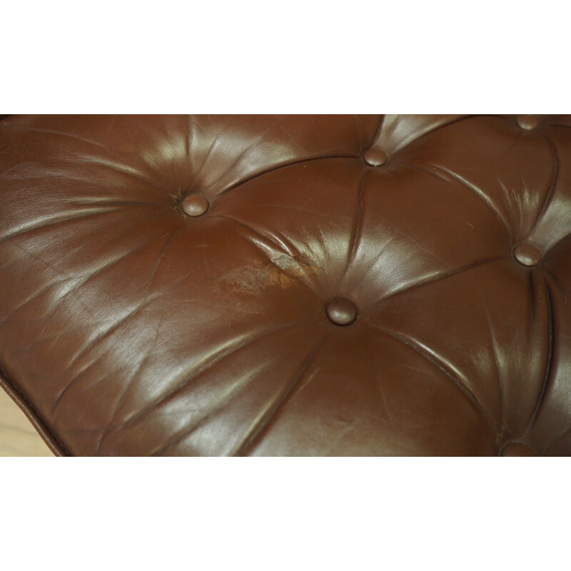 Vintage Danish armchair in leather from the 60s