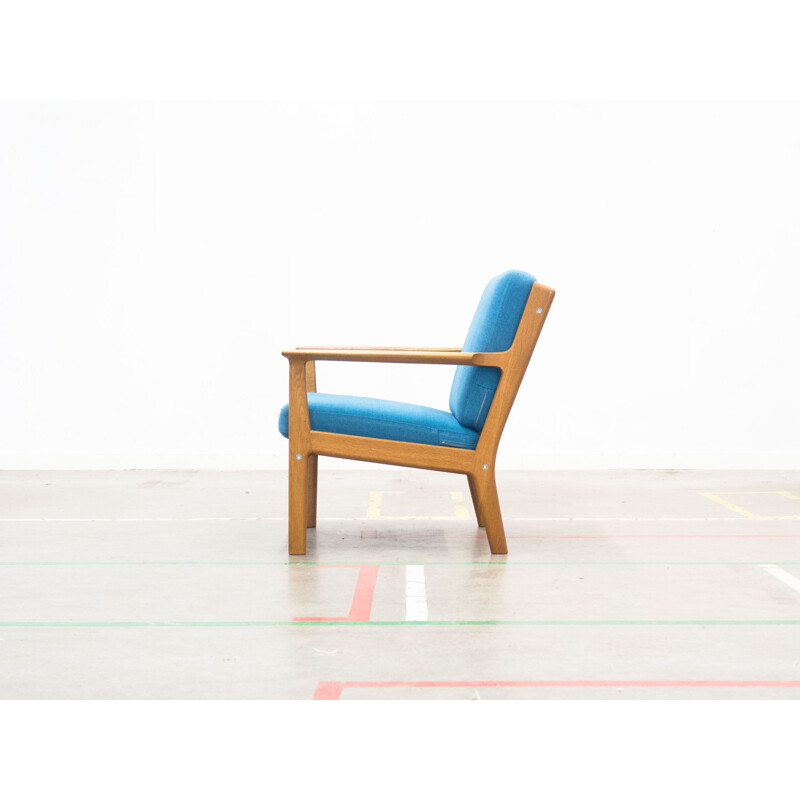 GE-265 blue armchair in oak by Hans J. Wegner for Getama