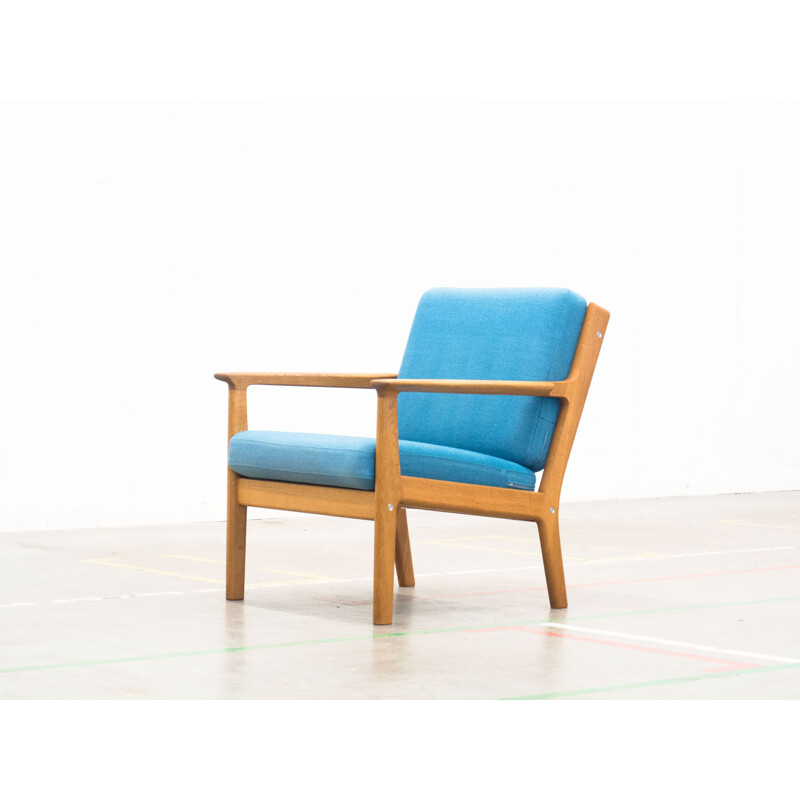 GE-265 blue armchair in oak by Hans J. Wegner for Getama
