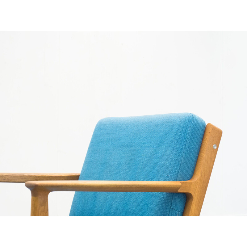 GE-265 blue armchair in oak by Hans J. Wegner for Getama