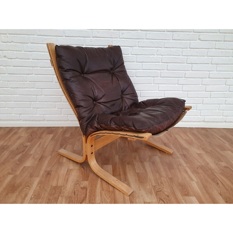 Vintage Siesta lounge chair by Relling in brown leather and beech 1970s