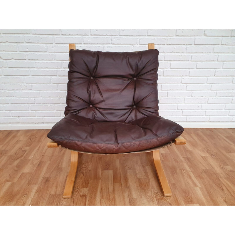 Vintage Siesta lounge chair by Relling in brown leather and beech 1970s