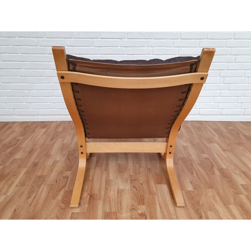 Vintage Siesta lounge chair by Relling in brown leather and beech 1970s