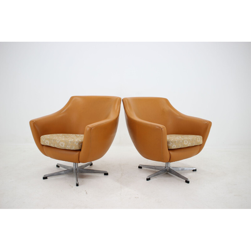 Pair of leather swivel armchairs 1970s