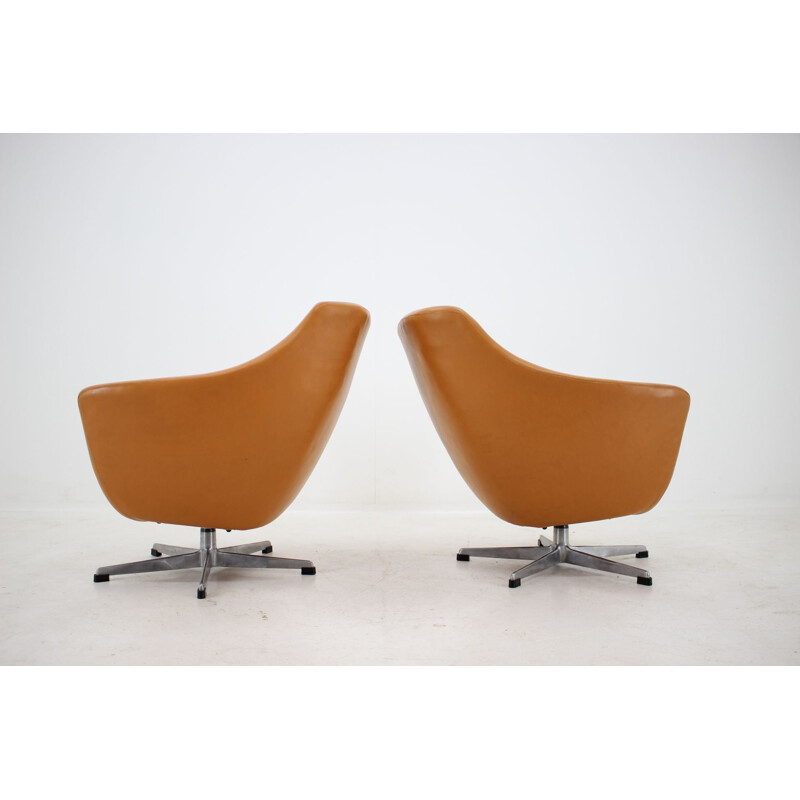 Pair of leather swivel armchairs 1970s