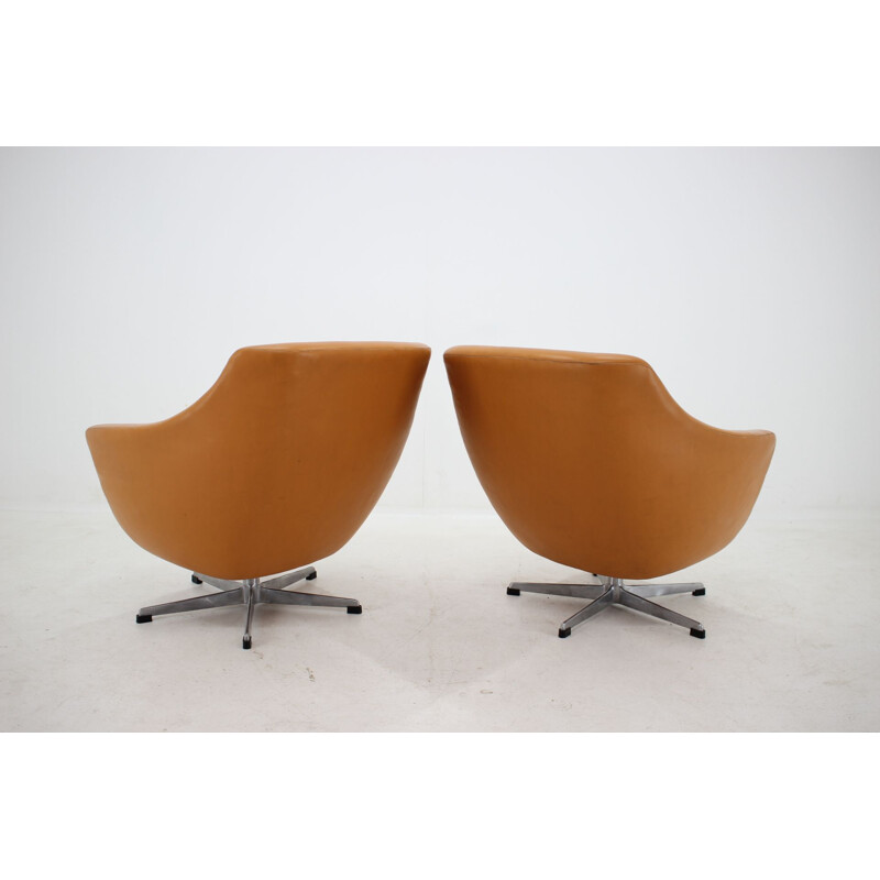 Pair of leather swivel armchairs 1970s