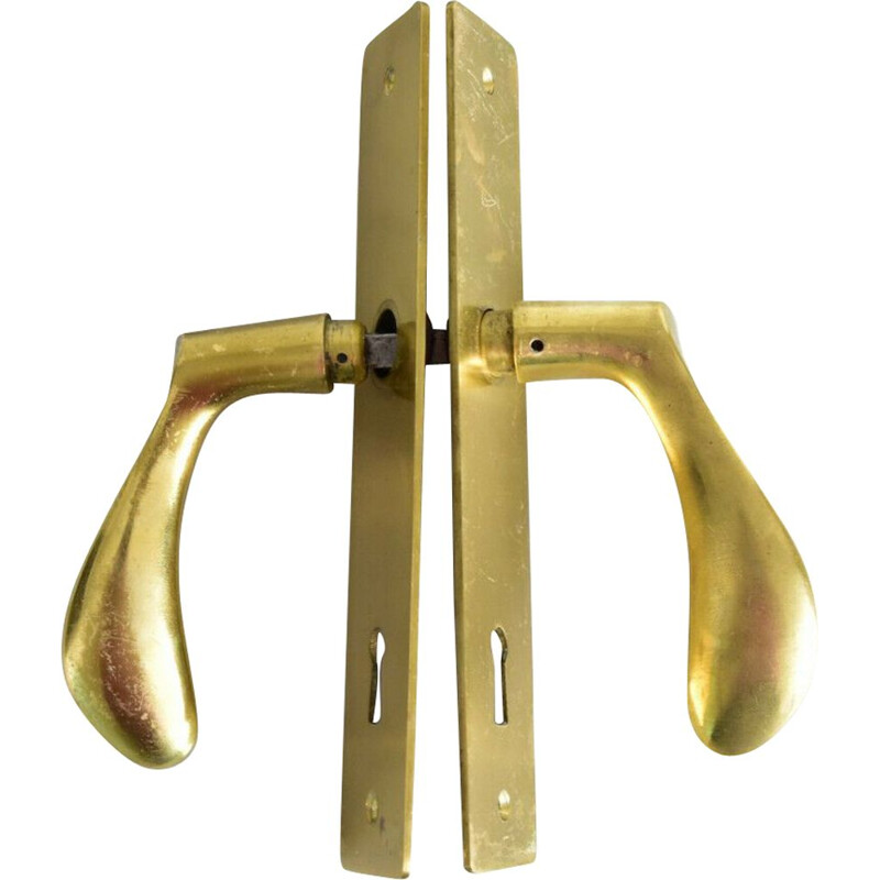 Set of 2 vintage door handles by Arne Jacobsen in brass 1950s
