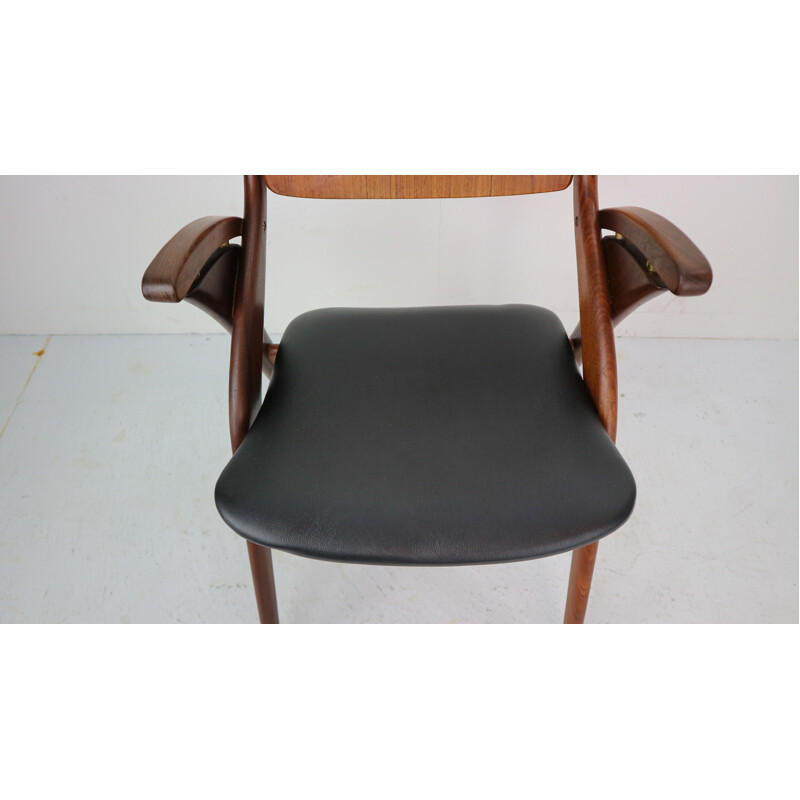 Vintage teak and black leather chair by Arne Hovmand-Olsen