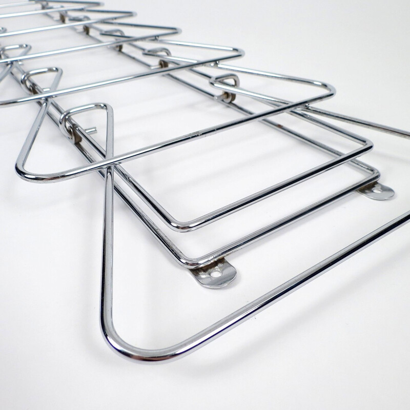 Vintage magazine rack in chromed metal