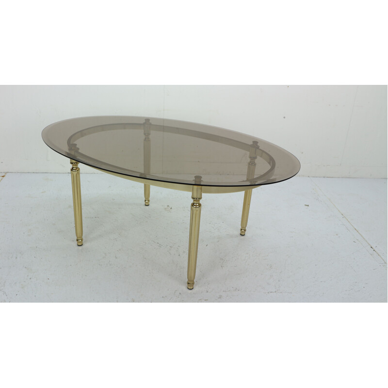 Vintage Hollywood Regency Smoked Glass and Brass Oval coffee Table 1970s