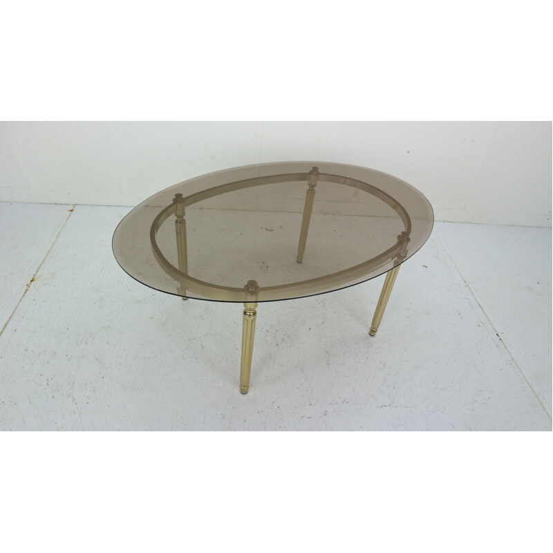 Vintage Hollywood Regency Smoked Glass and Brass Oval coffee Table 1970s