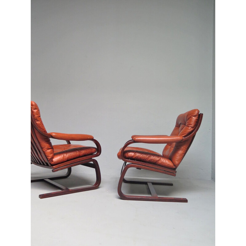 Vintage scandinavian armchairs in brown leather 1970s