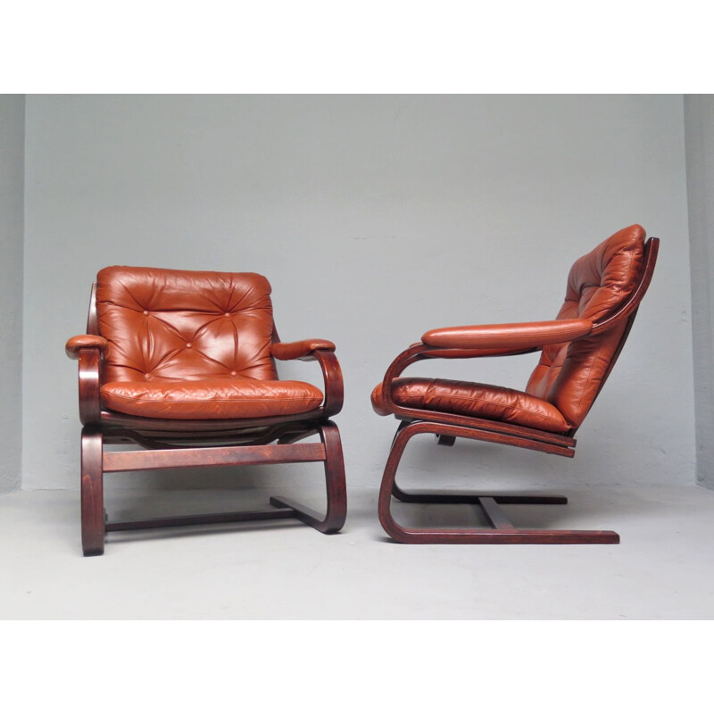 Vintage scandinavian armchairs in brown leather 1970s