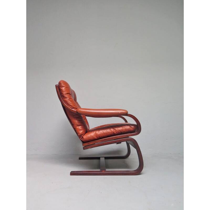 Vintage scandinavian armchairs in brown leather 1970s