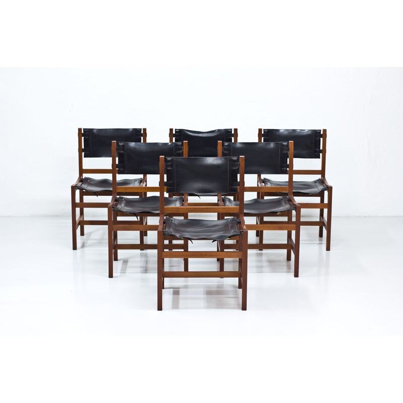 Set of 6 dining chairs in teak and black leather