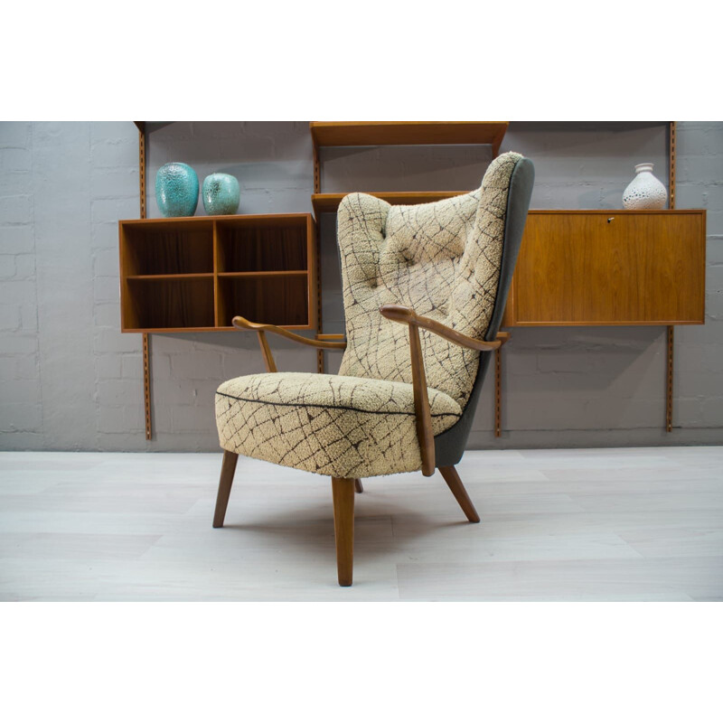 Vintage cocktail Wingback armchair in beige fabric 1950s