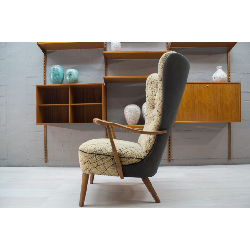 Vintage cocktail Wingback armchair in beige fabric 1950s