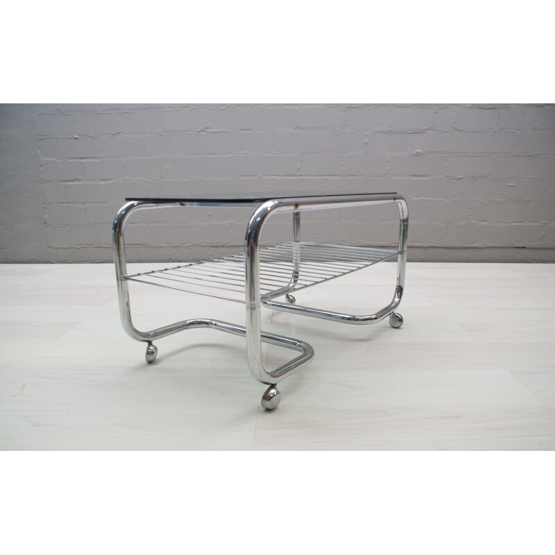 Vintage 2-Tier coffee table with wheels in chrome and smoked glass 1970s