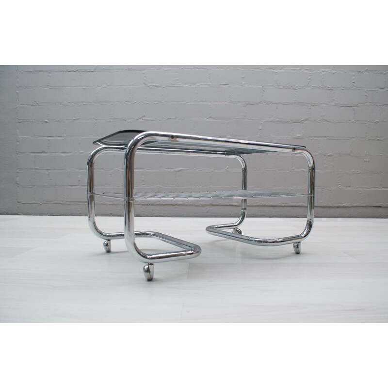 Vintage 2-Tier coffee table with wheels in chrome and smoked glass 1970s