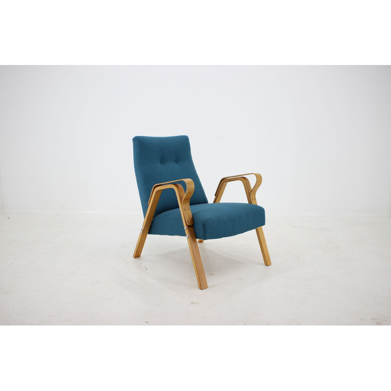 Vintage armchair for Tatra in blue fabric and wood 1970s