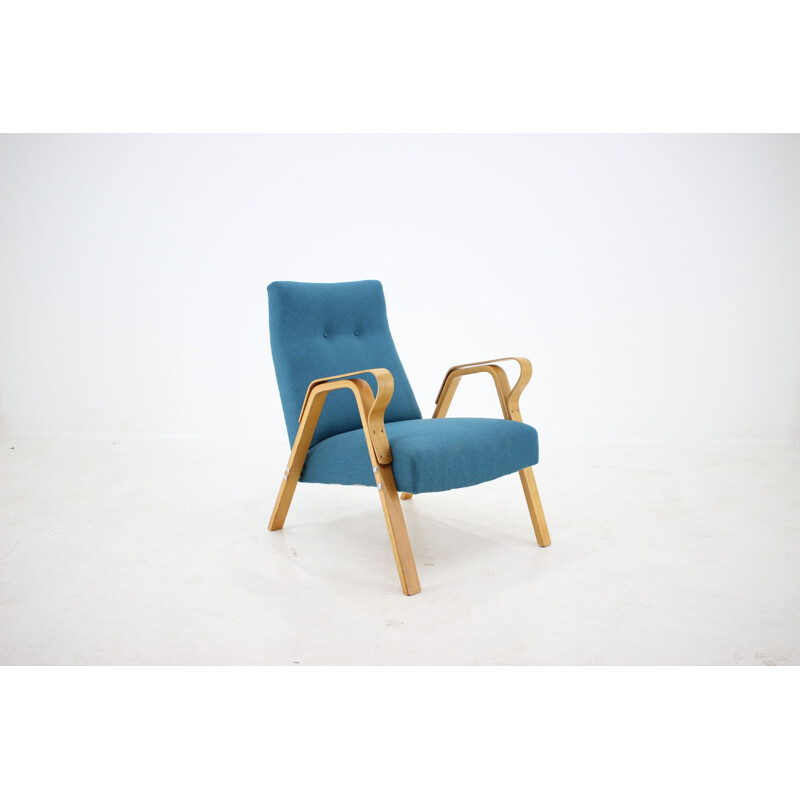 Vintage armchair for Tatra in blue fabric and wood 1970s