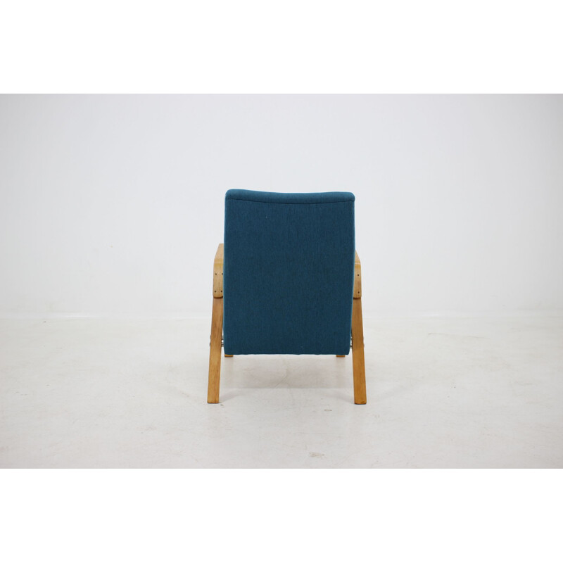 Vintage armchair for Tatra in blue fabric and wood 1970s