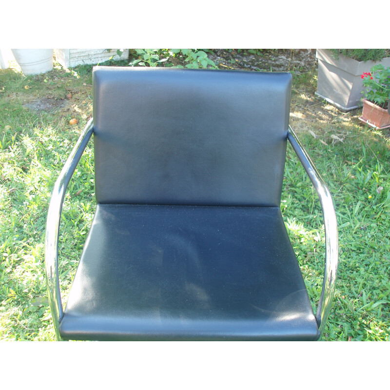 Set of 8 vintage armchairs in black leather and chrome 1970