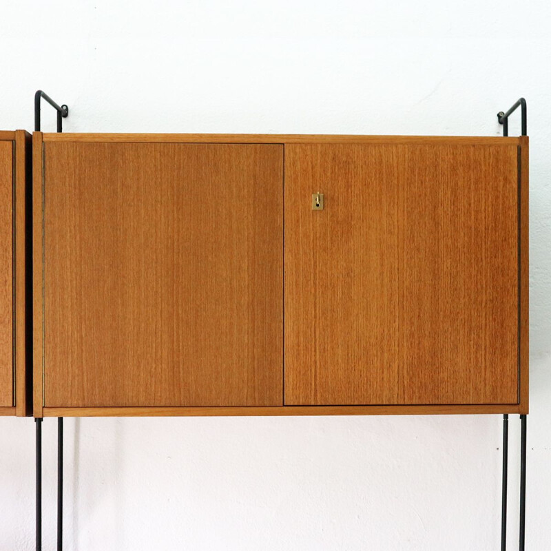 Vintage wall unit in teak by Omnia Hilker, 1960s