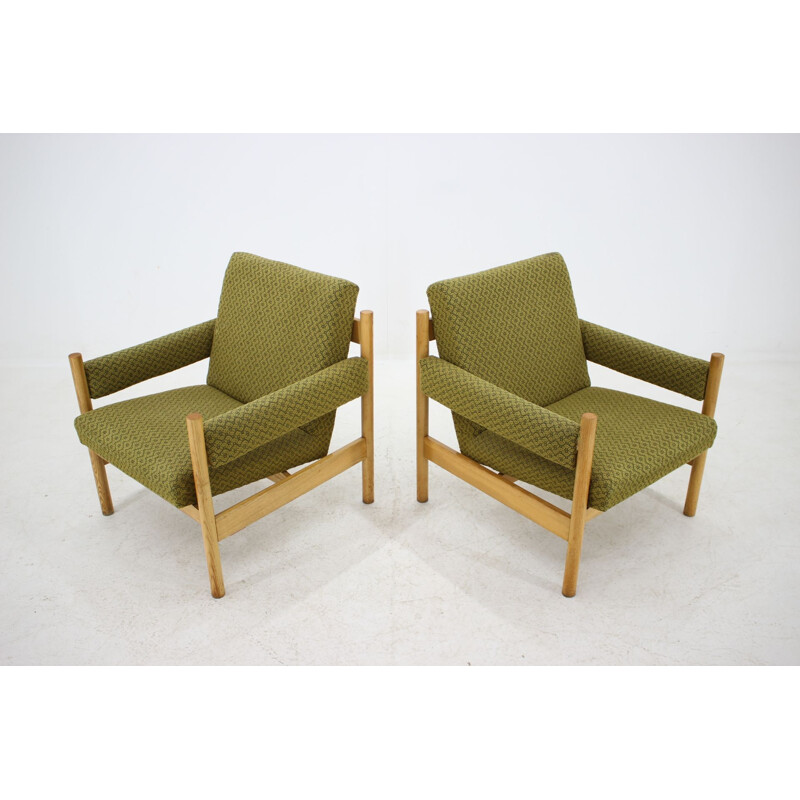 Pair of vintage armchairs for Dřevotvar Pardubice in green fabric and wicker 1970s