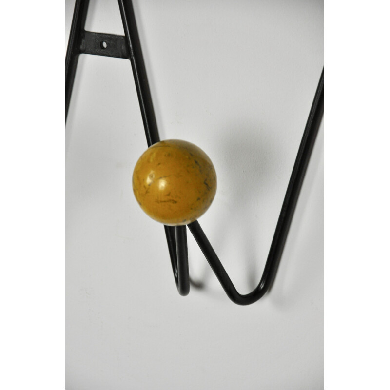 Roger Feraud's vintage coat rack in wood and metal 1960