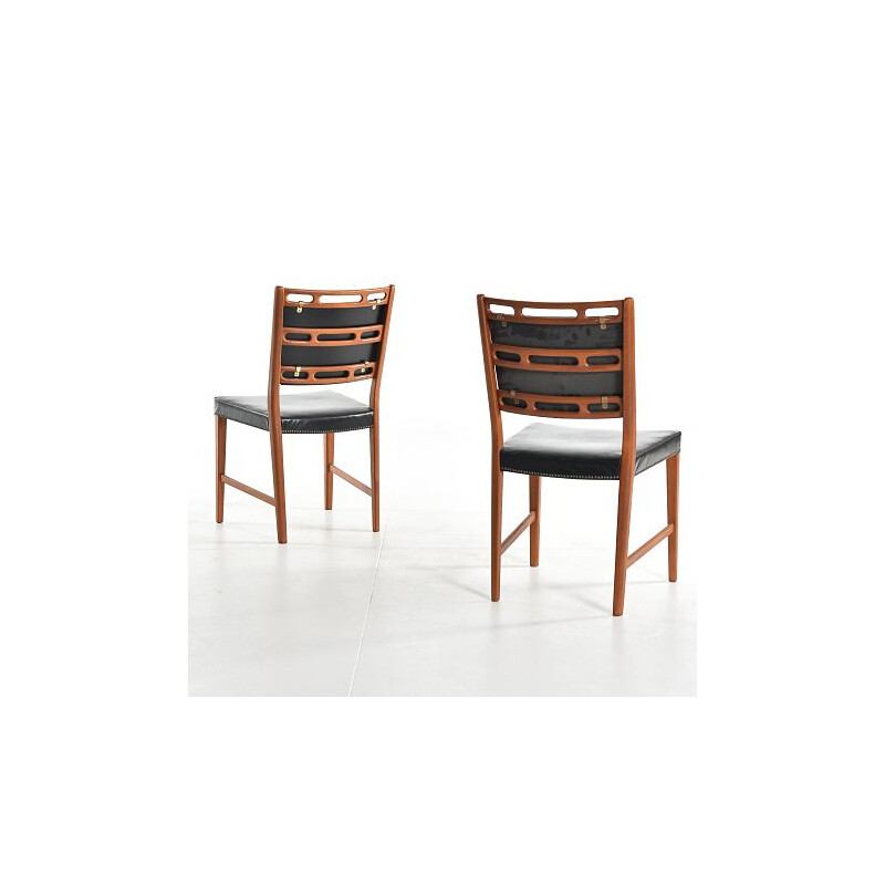 Rosen's futur Futura chair in teak and faux black leather