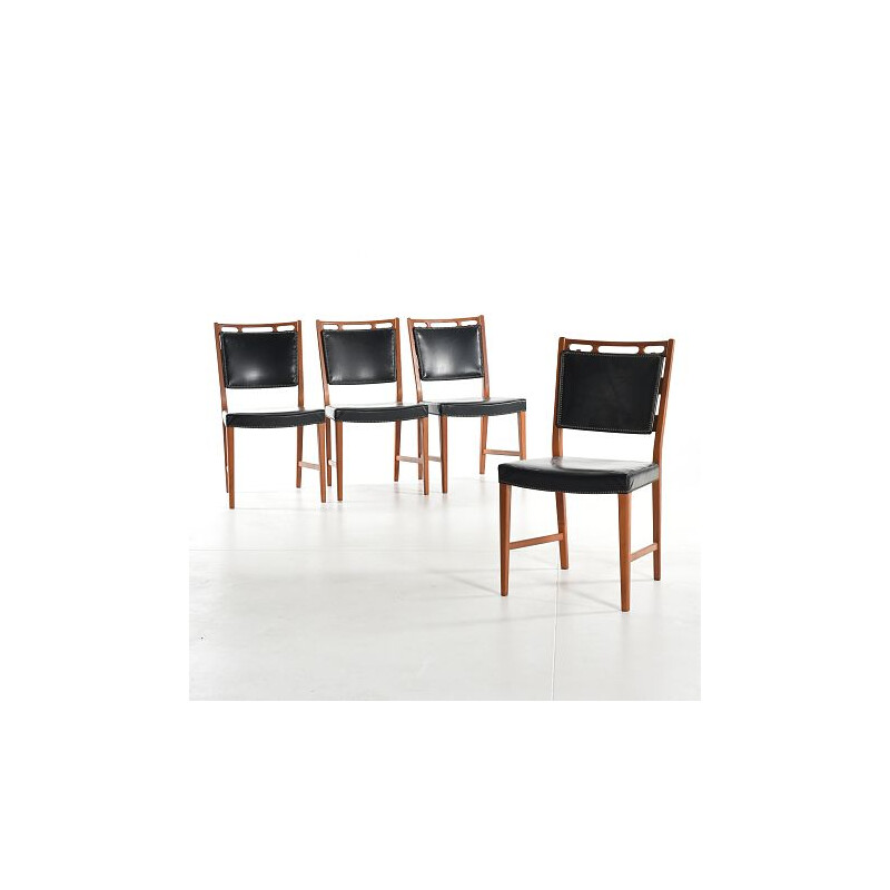 Rosen's futur Futura chair in teak and faux black leather