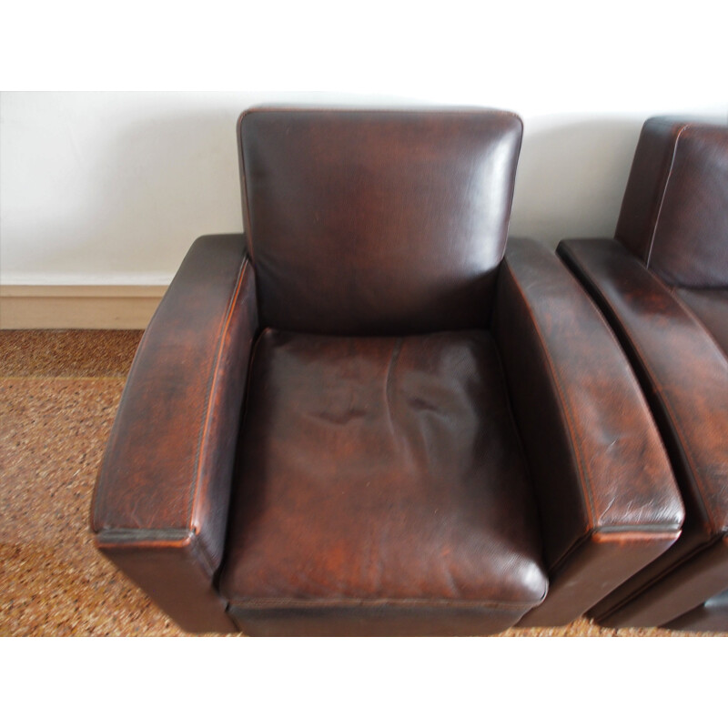 Pair of vintage french armchairs in brown leather 1980