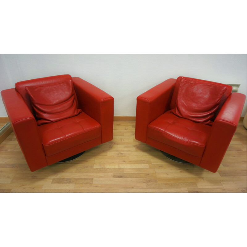 Pair of vintage red leather armchairs