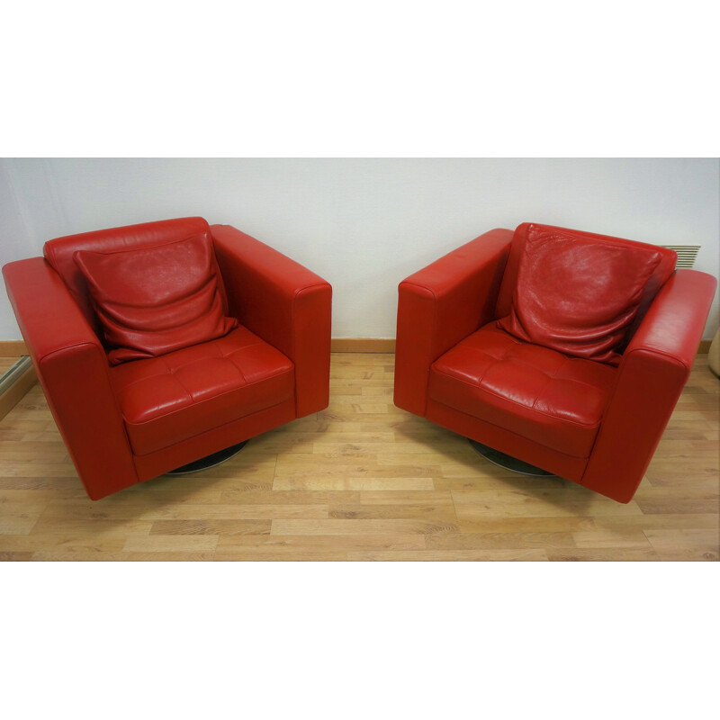 Paire de fauteuils rouges vintage en cuir
